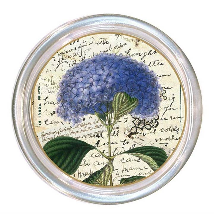 Five-inch glass coaster with high rim and black velvet back.