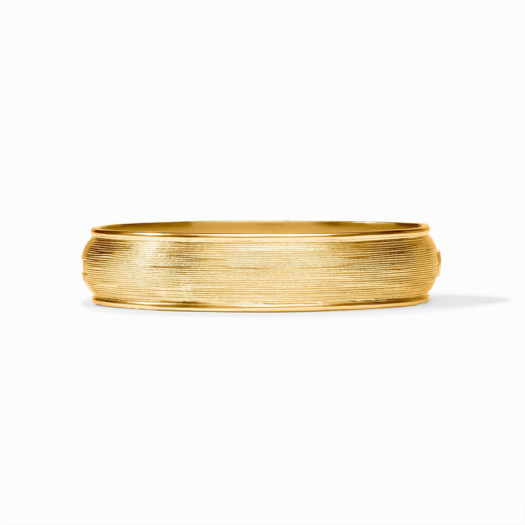 Cobblestone Hinge Bangle in 24K gold plate with a textured, horizontal-lined finish.