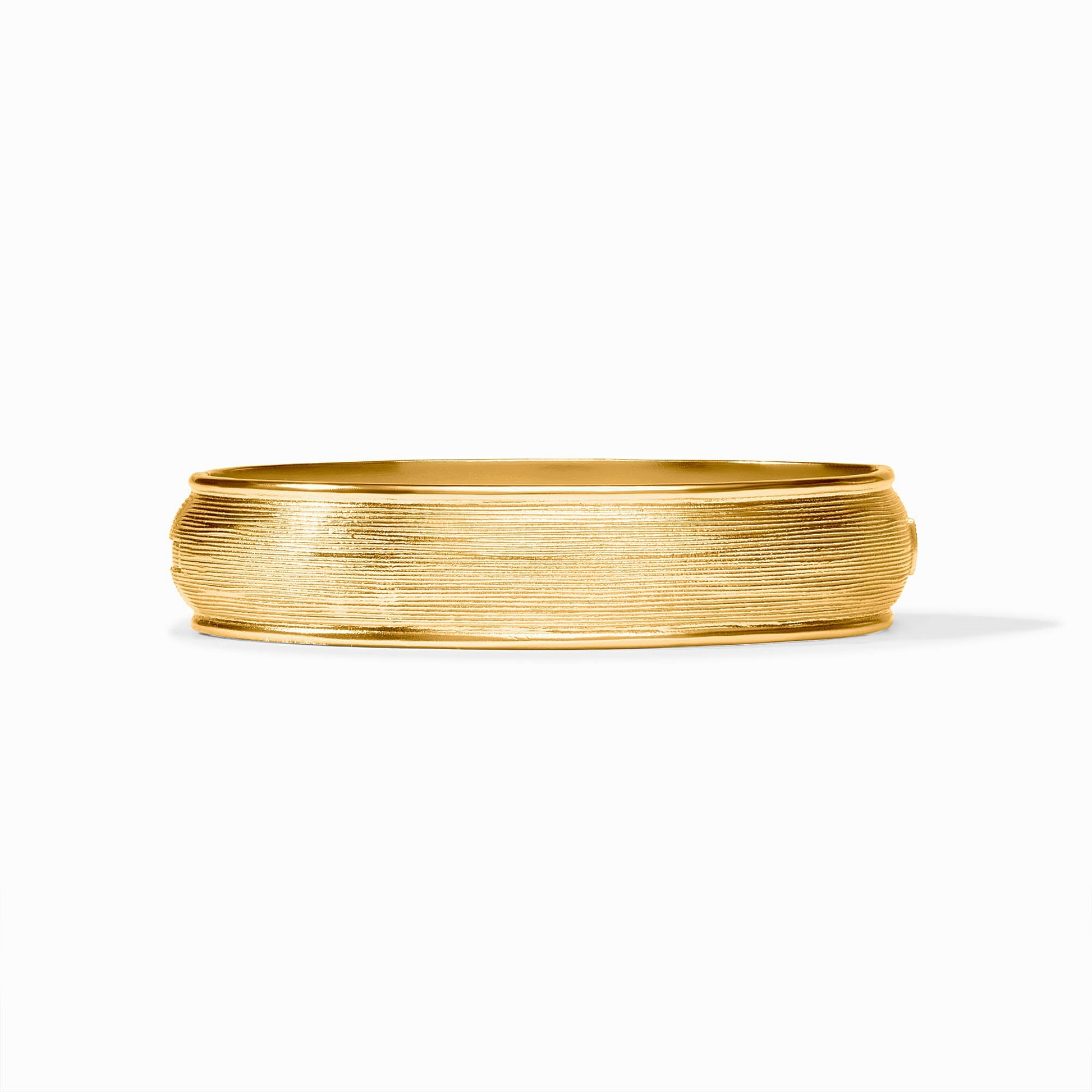 Cobblestone Hinge Bangle in 24K gold plate with a textured, horizontal-lined finish.