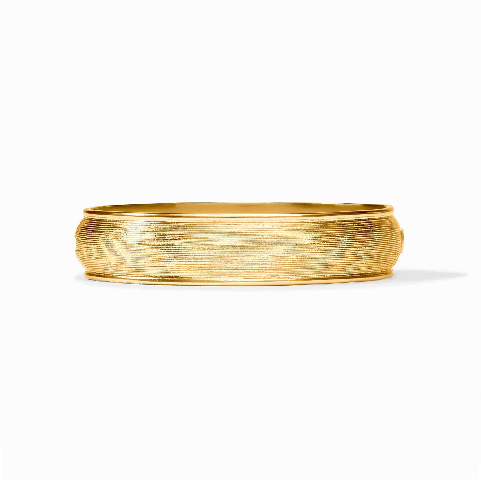 Cobblestone Hinge Bangle in 24K gold plate with a textured, horizontal-lined finish.