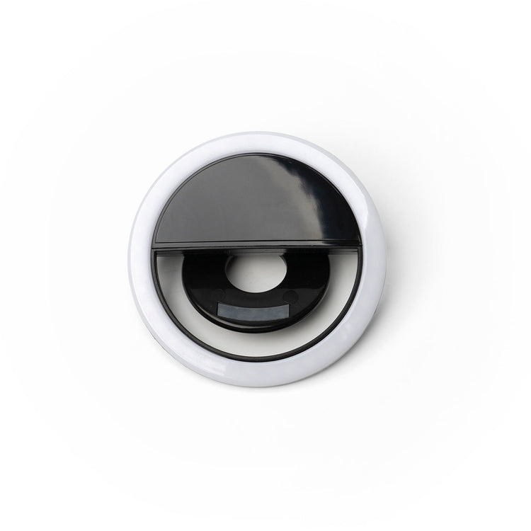 Modern Monkey Selfie Light, a circular white and black clip-on LED ring light for devices.