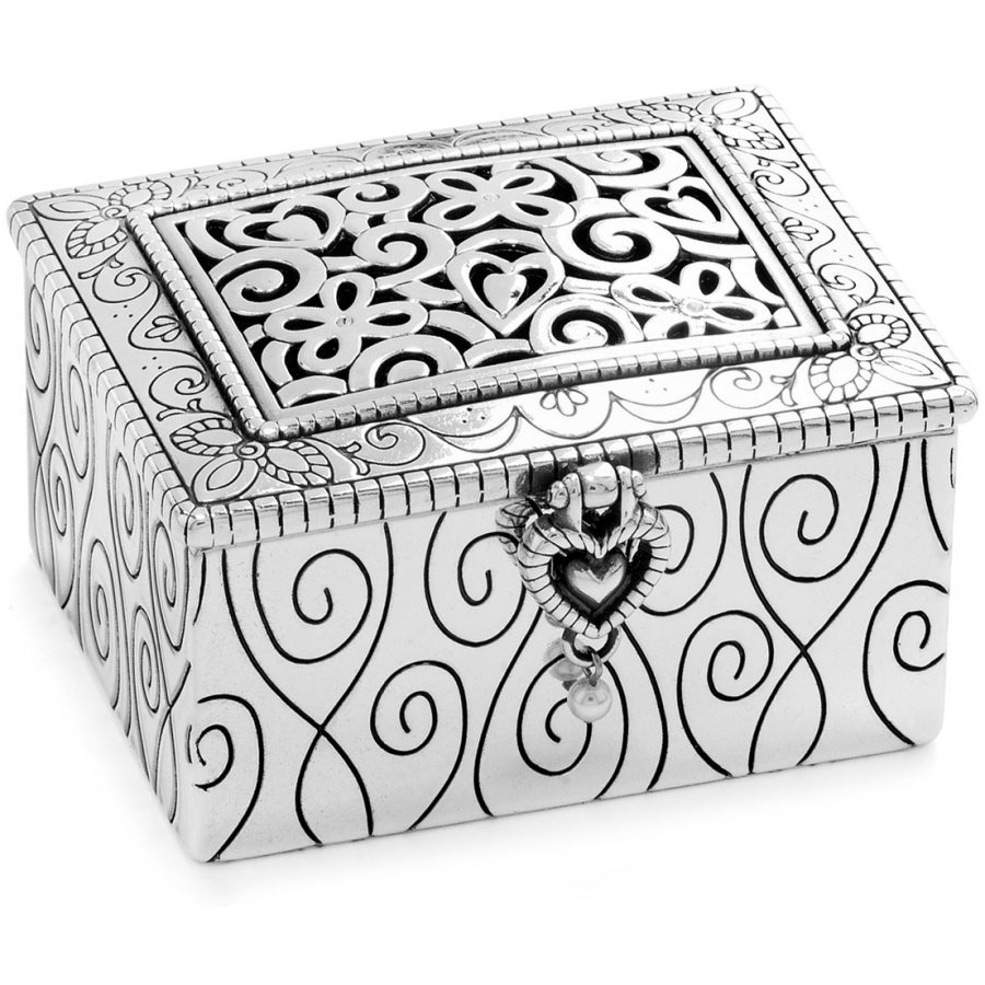 Lacie Daisy silver-plated jewel box with floral filigree lid and heart-shaped latch.
