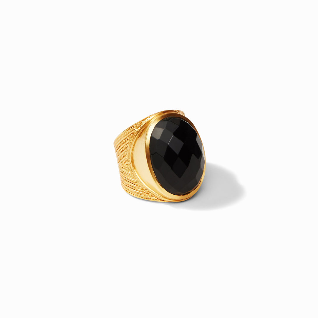 Verona statement ring in gold with a large, faceted oval black obsidian stone.