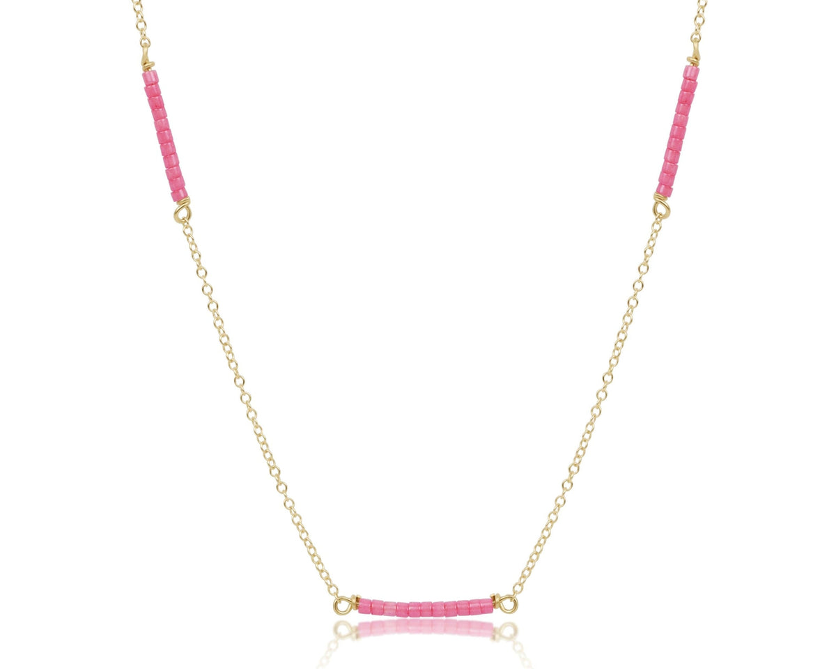 15-inch gold-filled chain choker with three sections of pink seed beads.