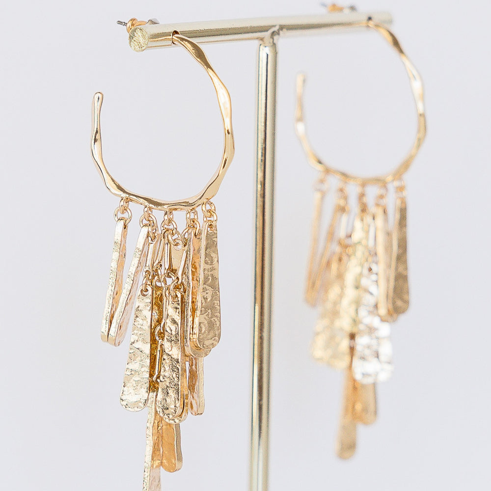 Silver-tone Ellis hoop earring with a smooth circular shape.