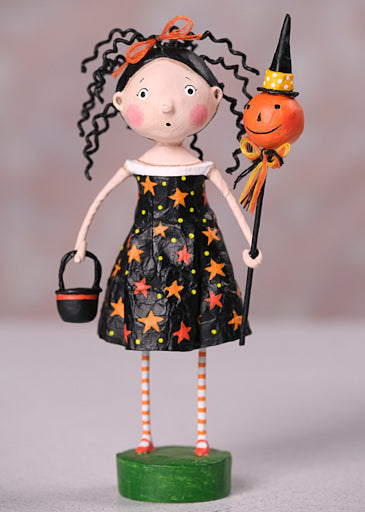 Crimp and Crinkle figurine by Lori Mitchell, a girl in a star dress with a pumpkin wand and bucket.