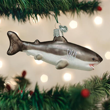 Great White Shark glass ornament hanging on a Christmas tree branch.