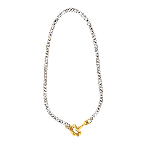 Gill Necklace featuring a silver-tone curb chain with a gold-tone toggle clasp centerpiece.
