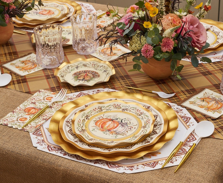 Turkey & Gourds Wavy Salad Plate on a Thanksgiving table setting with pumpkins and flowers.