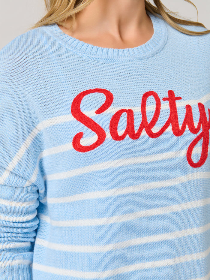 Kathrine Salty relaxed fit pullover sweater in soft knit with drop-shoulder silhouette and playful lettering.