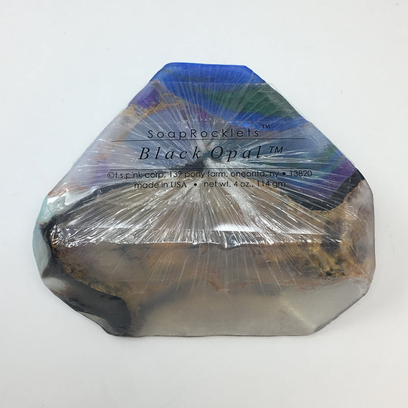 Handcrafted stone-shaped glycerine soap bar infused with natural botanicals like aloe and lavender.