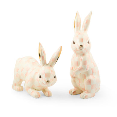 Handmade fiberglass trophy bunny figurine with a rosy check pattern on its body.