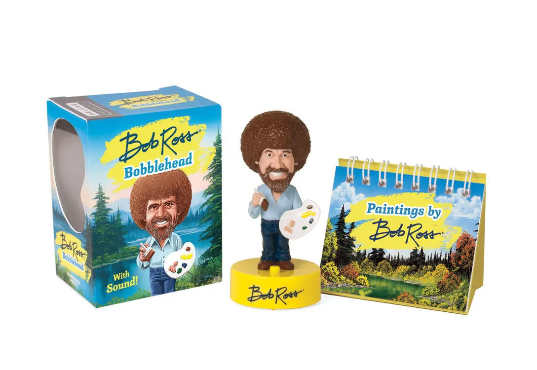 Bob Ross Bobblehead with sound, original box, and a mini easel book of landscape paintings.