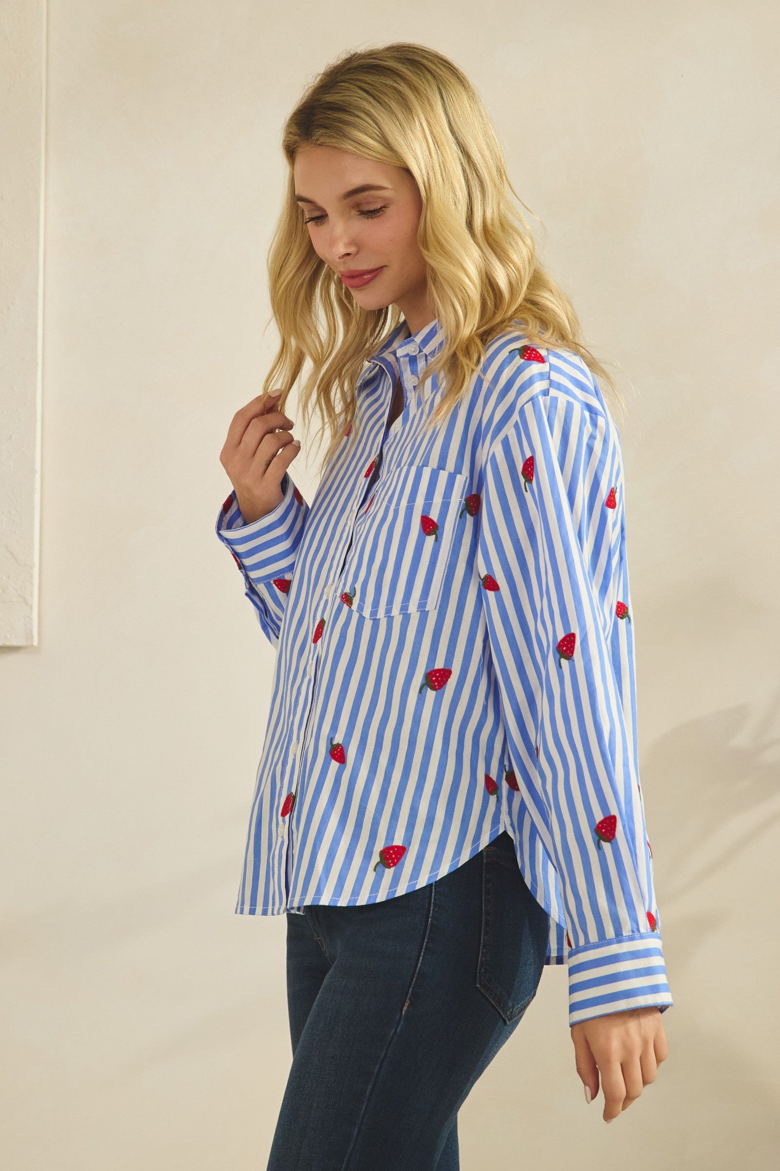 Strawberry embroidered cotton button-down blouse with a classic fit.