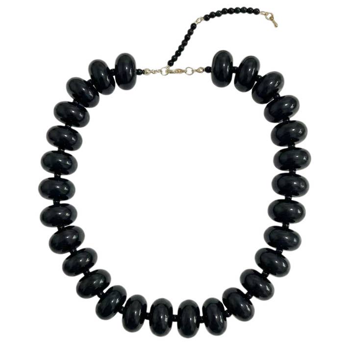 Bailey Chunky Beaded Necklace featuring large, glossy black marbled beads on a gold-tone chain.