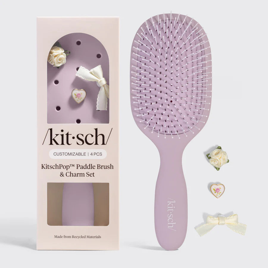 KitschPop Paddle Brush and Charm Set in lavender with rose, heart, and bow charms.