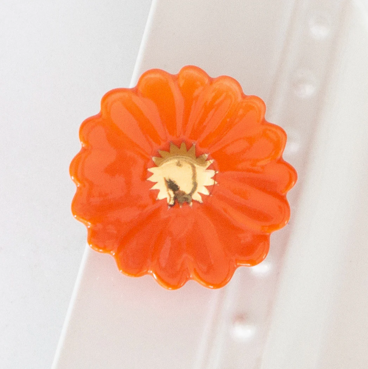Orange Gerber Daisy floral print dress with a relaxed A-line silhouette.