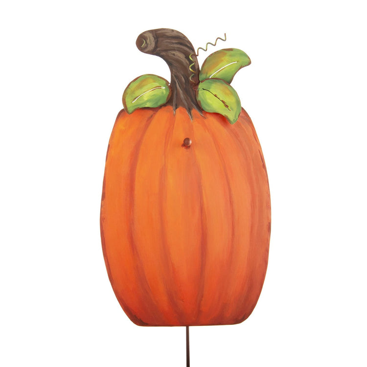 Hand-painted orange metal pumpkin garden stake with a brown stem and green leaves.