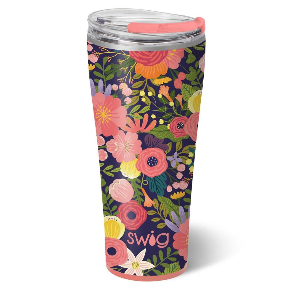 32oz stainless steel tumbler with a colorful floral pattern on a dark blue background.