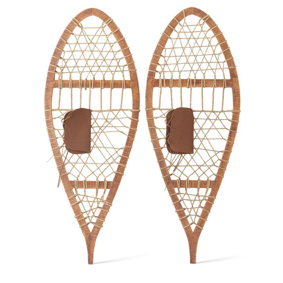 Pair of 42-inch decorative wooden snowshoes with pine frames and woven netting.