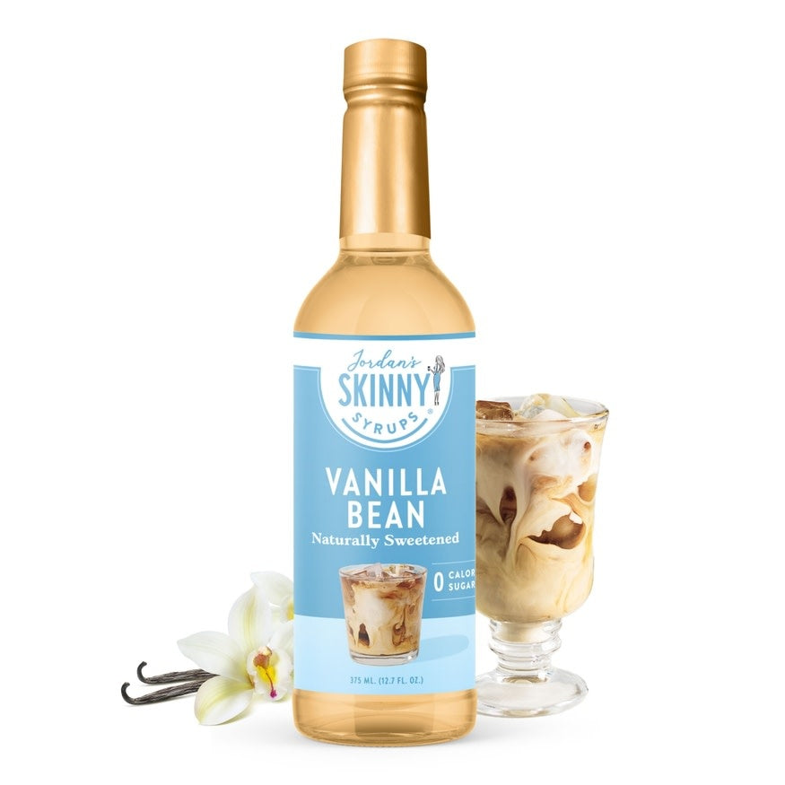 Bottle of naturally sweetened cinnamon dolce syrup with a clear label.