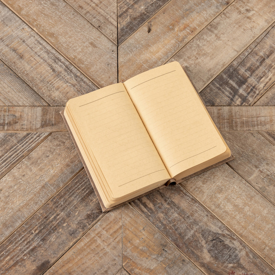 7-inch House of Dreams journal with wood cover featuring a house illustration.