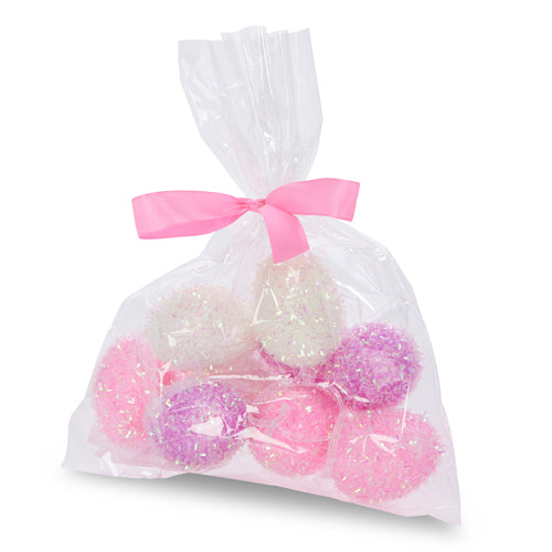 Bag containing iridescent purple, pink, and white foam eggs with glitter.