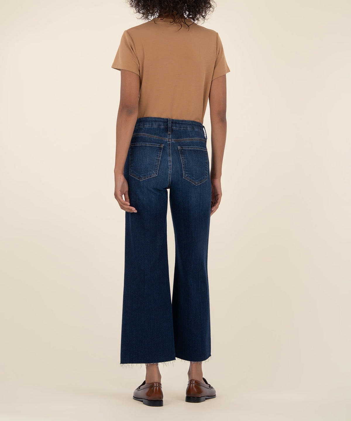 Women's Meg high-rise wide-leg trousers in raw hem with smoothing Fab Ab fabric.