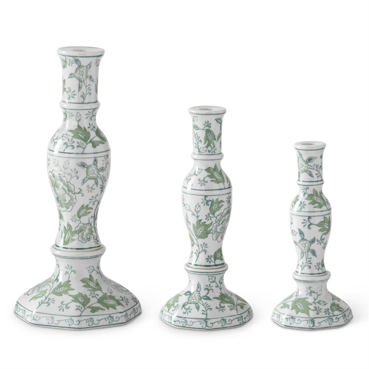 Ceramic taper candleholder in green and white floral pattern with tapered cylindrical silhouette.