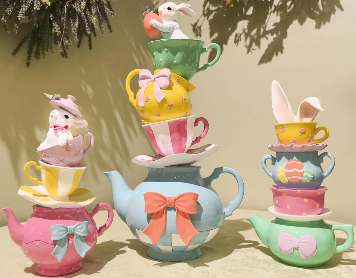 White ceramic bunny-shaped kettle with long handle spout