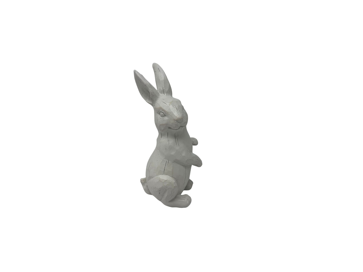 Small white resin standing rabbit figurine with a carved wood-like texture.