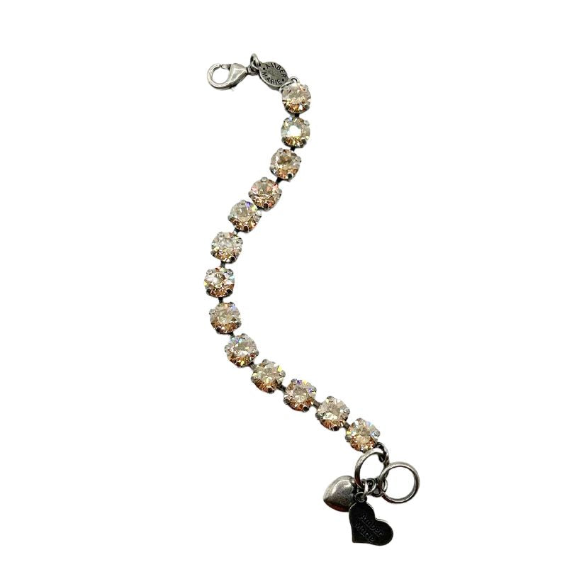 Classic Bracelet in Istanbul featuring dark blue, brown, and gold tones with a textured pattern.