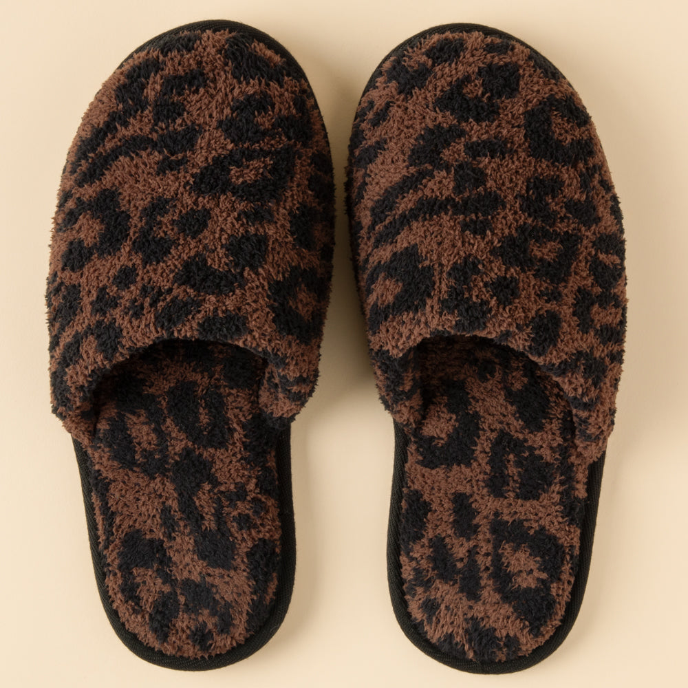 Slip-on marshmallow slippers in tonal leopard print with plush knit lining and cushioned sole.