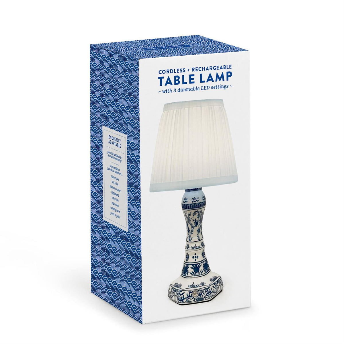 Cordless blue and white floral ceramic table lamp with a pleated shade in its gift box packaging.
