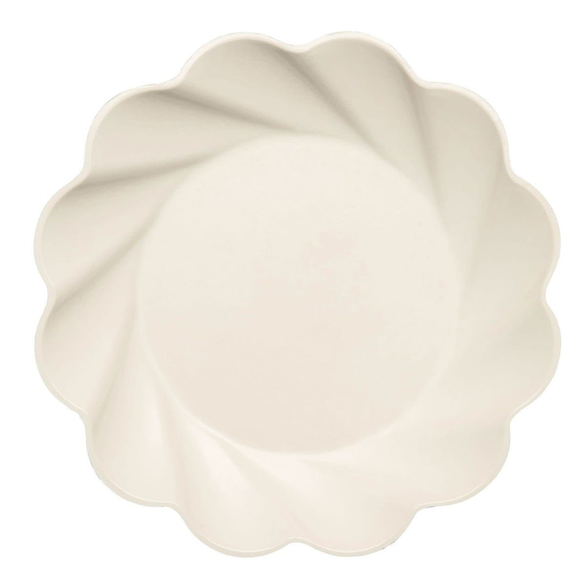 Cream-colored wavy eco dinner plate made from bamboo fiber blend.