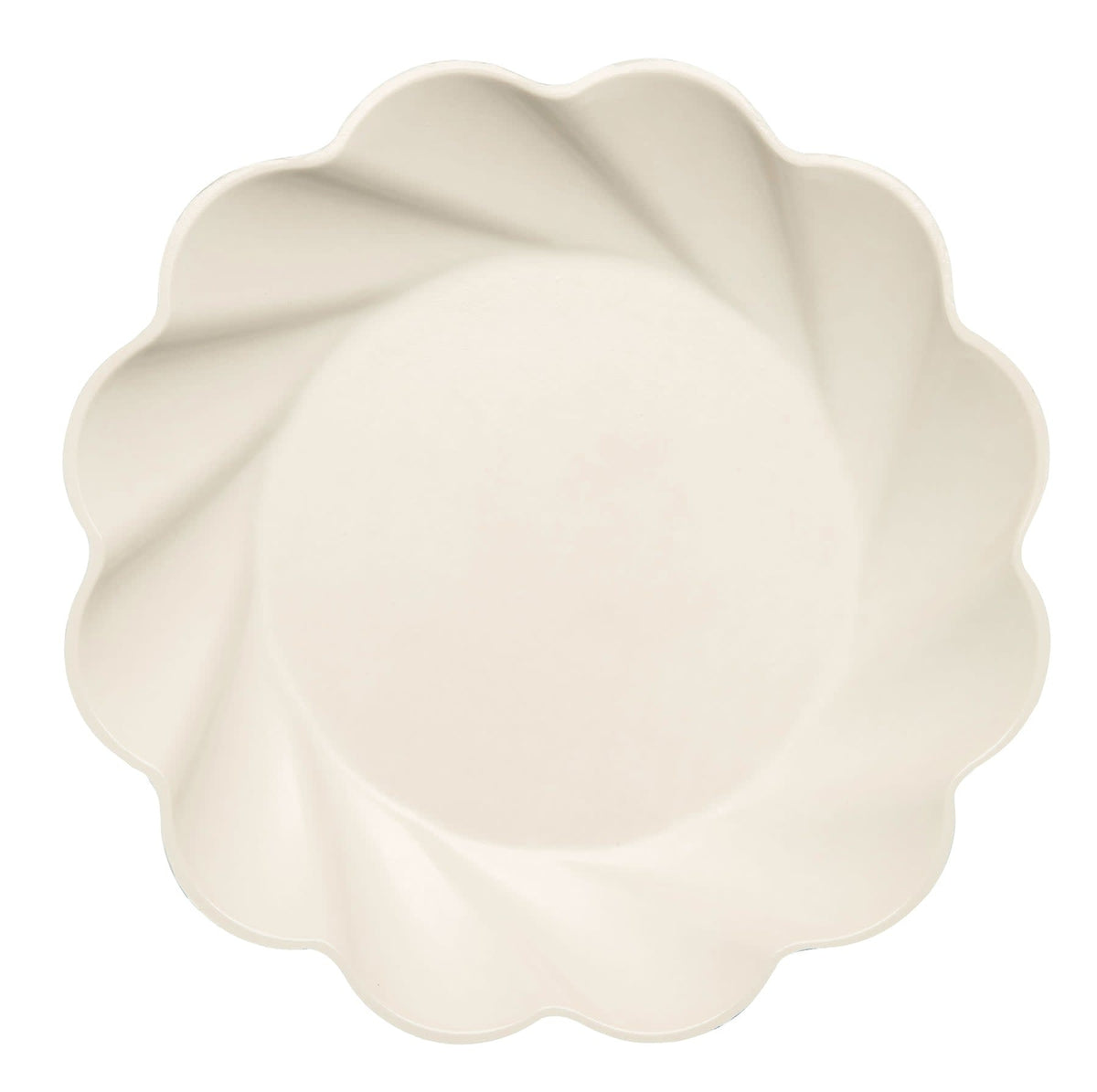 Cream-colored wavy eco dinner plate made from bamboo fiber blend