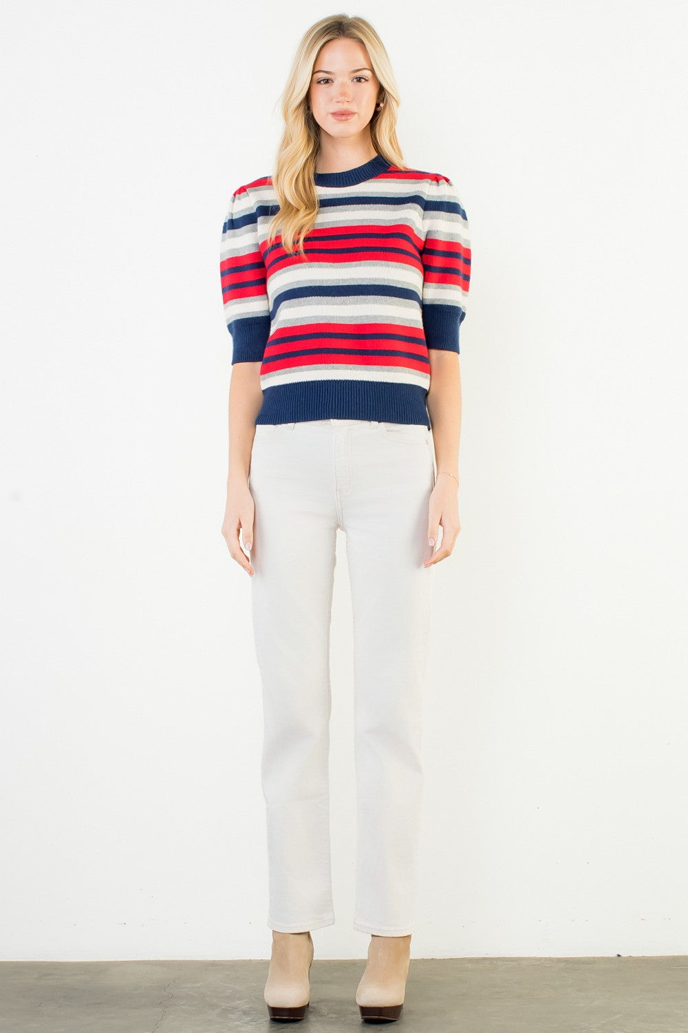 Charlene short sleeve knit top in multi-color viscose nylon polyester blend with relaxed silhouette.