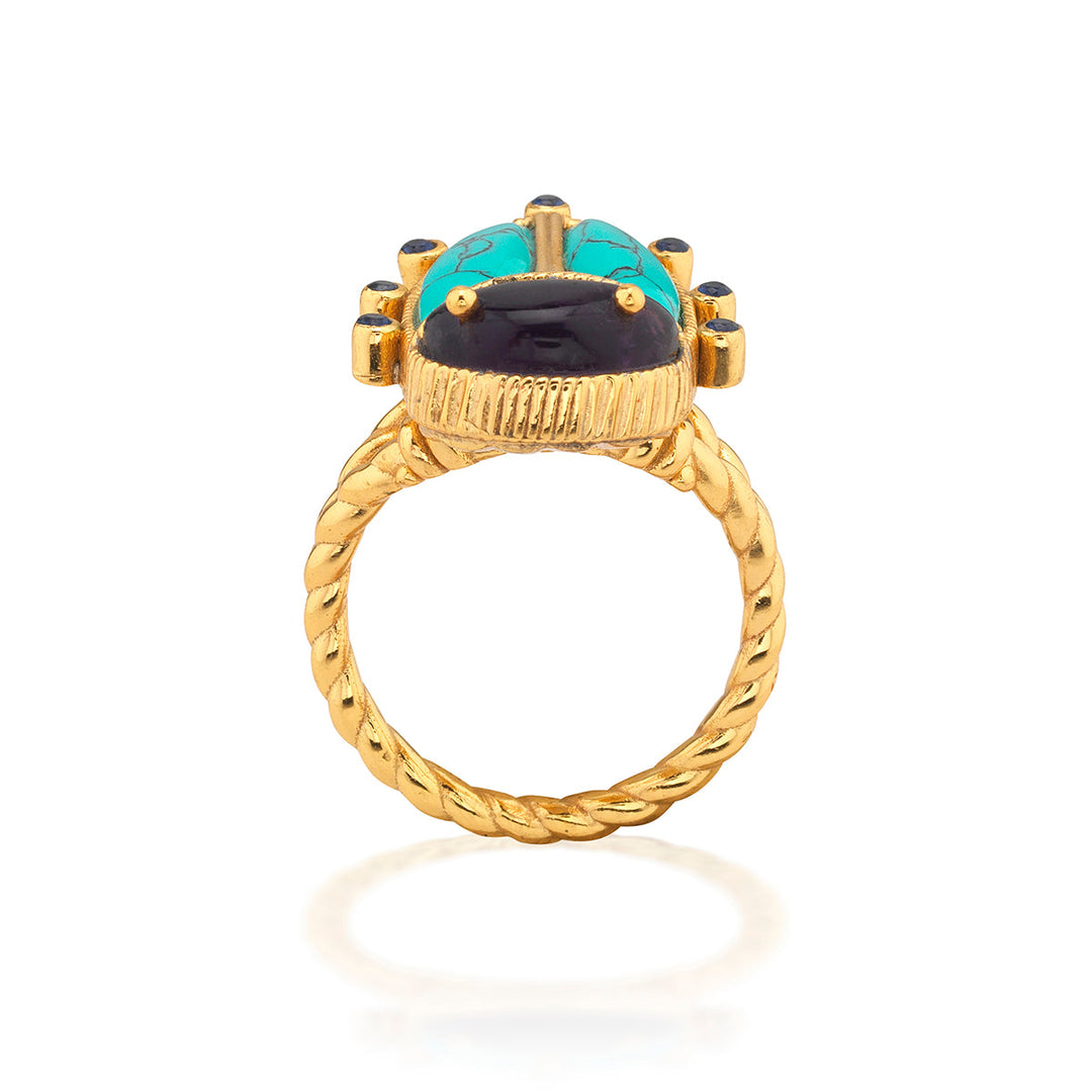 Scarab Grande ring in gold-plated brass featuring a detailed scarab beetle silhouette on the band.