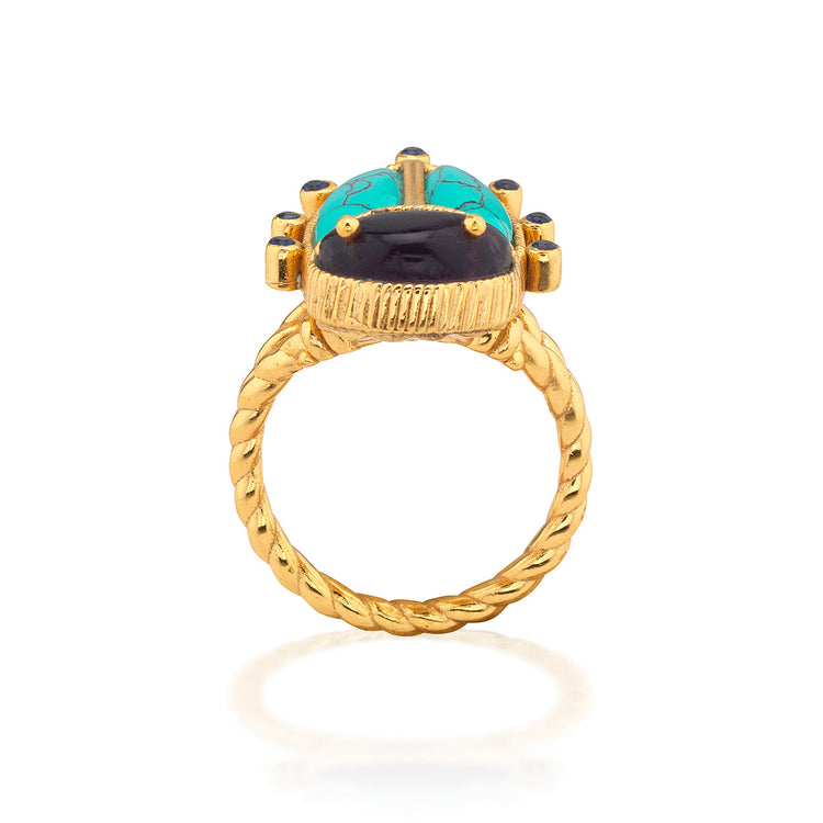 Scarab Grande ring in gold-plated brass featuring a detailed scarab beetle silhouette on the band.