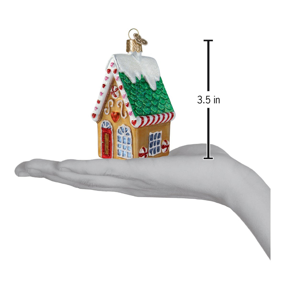 Cookie Cottage Ornament, a 3.5-inch tall gingerbread house held in a hand for scale.