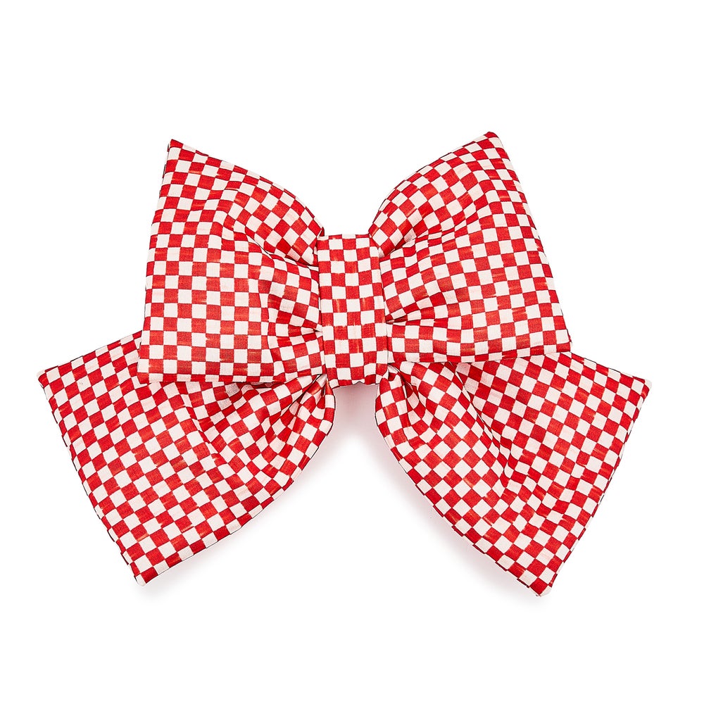 A red and white checkered bow made of polyester fabric.