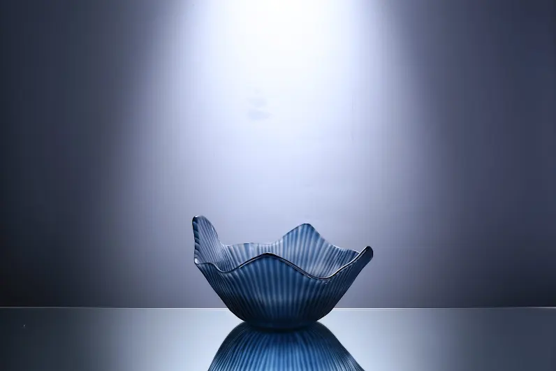 Round glass bowl with a smooth rim and transparent finish.