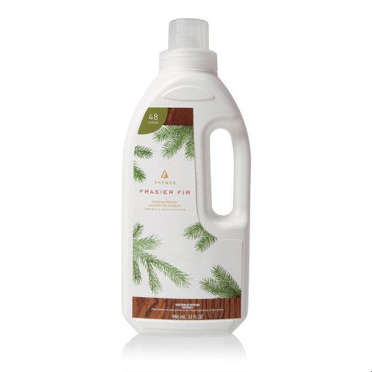 Frasier Fir Concentrated Laundry Detergent in a white 32 fl oz bottle with pine needle graphics.