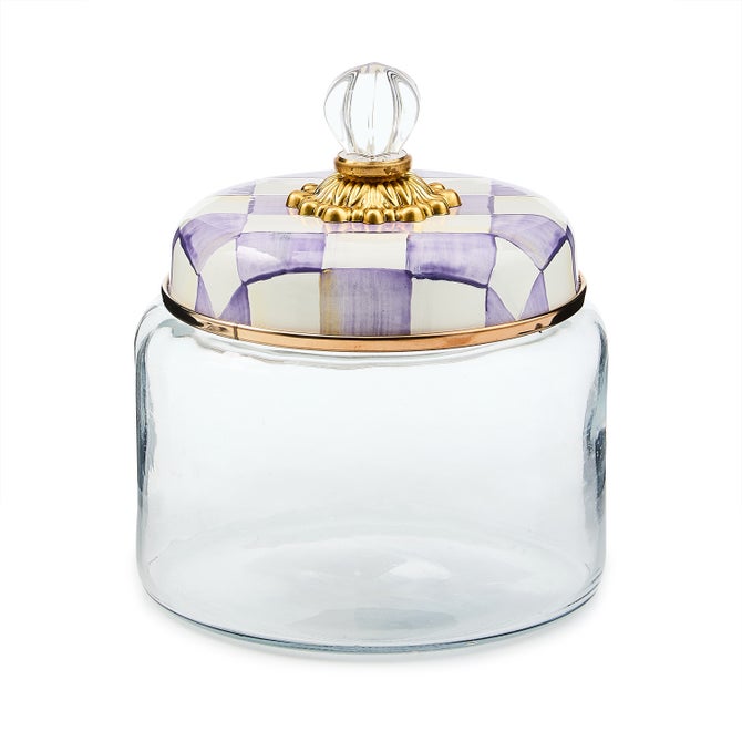 Violet checkered small kitchen canister with a cylindrical shape.