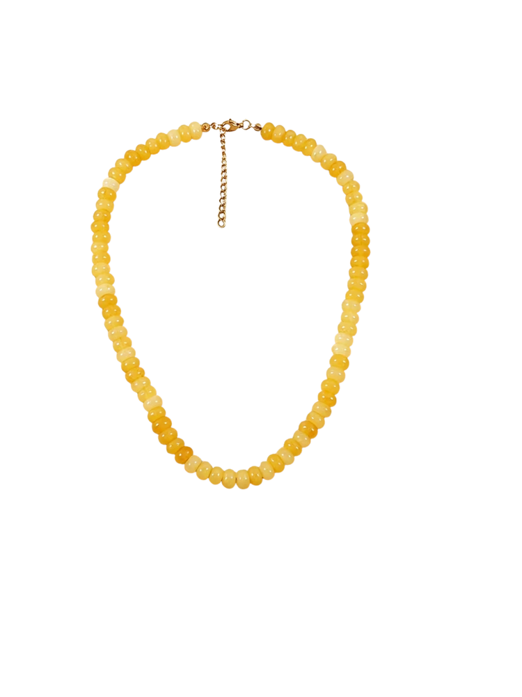 Yellow glass beaded necklace with a gold-tone lobster clasp and extender chain.