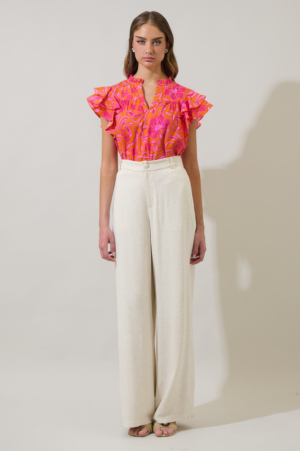 Rea Floral Emery split neck top in floral print cotton fabric with a relaxed silhouette.