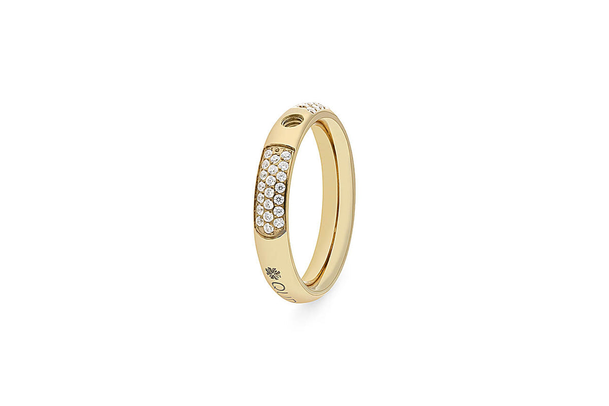 Gold ring with a band of small diamonds and a subtle engraved logo.