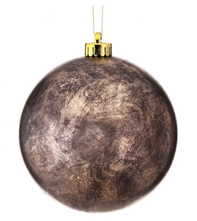 Antique vacuum plate ball ornament with a vintage-style geometric pattern on white plastic.