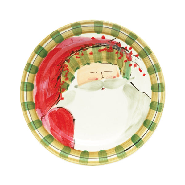 White Terra Bianca earthenware dinner plate with Old St. Nick handpainted holiday scene design.