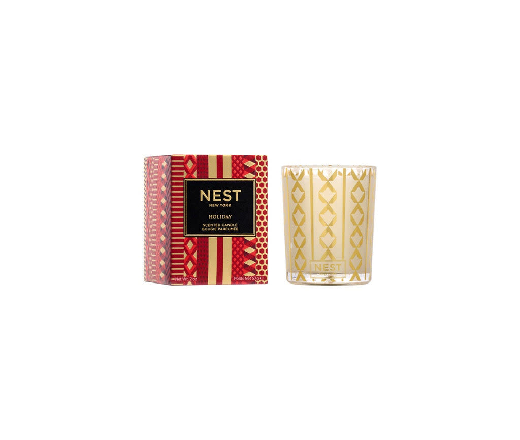 Nest Votive Candle in a clear glass holder with white wax.